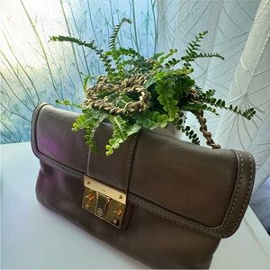 Brown and Gold Leather Shoulder Bag with Elegant Clasp